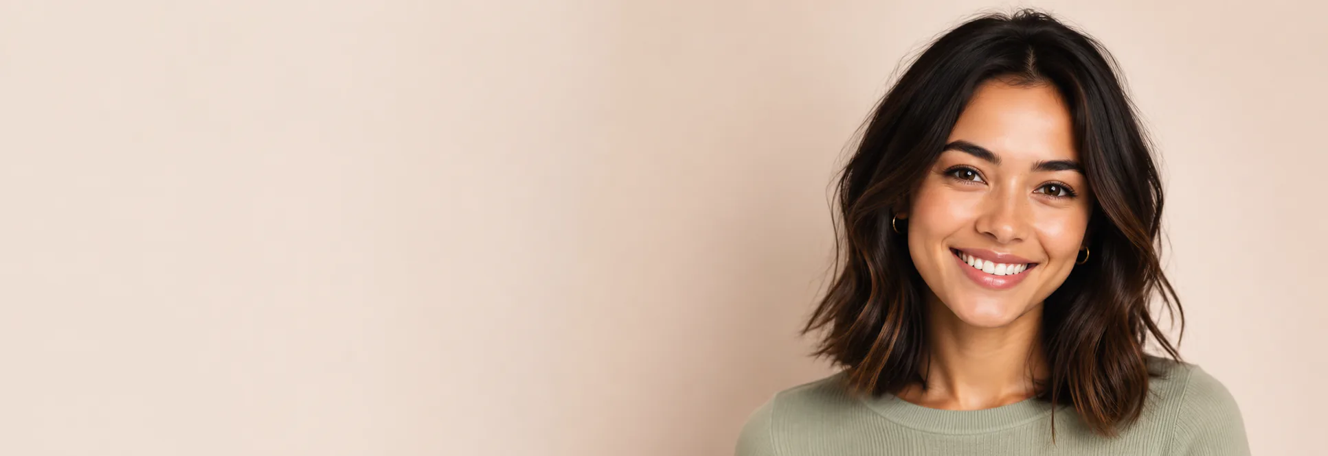 Smiling young woman with shoulder-length dark hair